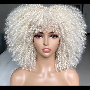 Ash blonde curly synthetic wig. Brand new.